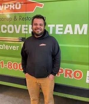 Team Member photo of Darren standing in front of a SERVPRO vehicle