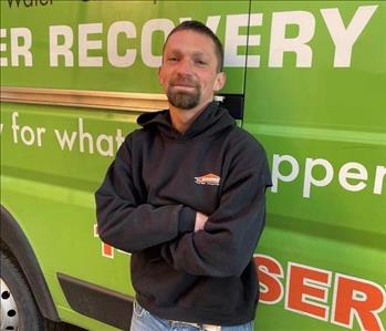 Team Member photo of Tim standing in front of a SERVPRO vehicle